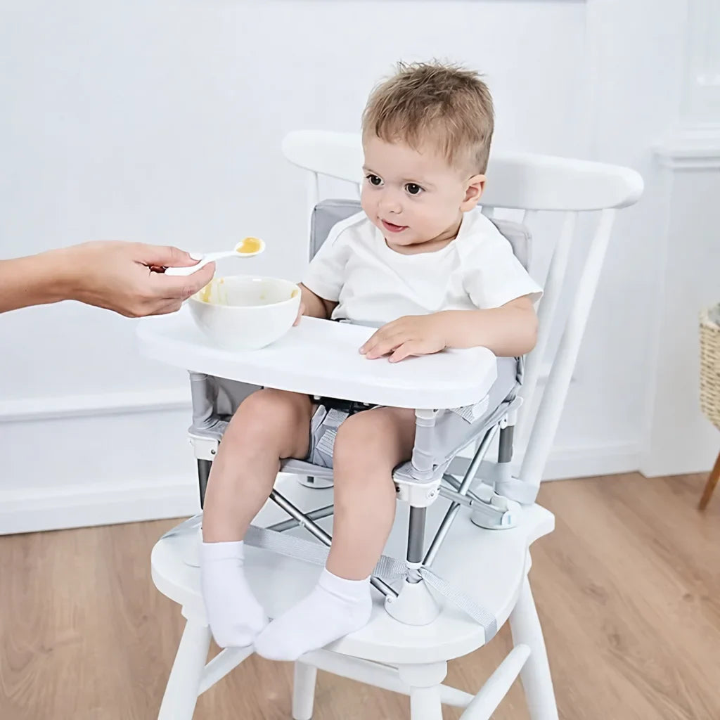 Scaun bebe, pliabil, compact, portabil, usor de depozitat, cu tava detasabila, pentru masa si joaca, cu spatiu de depozitare, ham de siguranta in 5 puncte